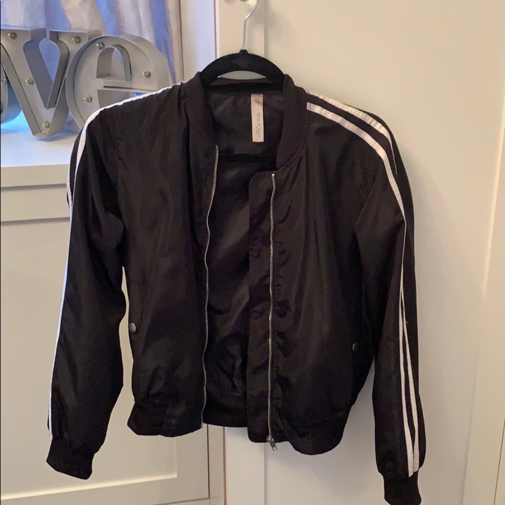 black jacket with white stripes